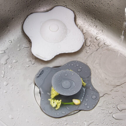 Bouchon de vidange à pression pour éviers et baignoires